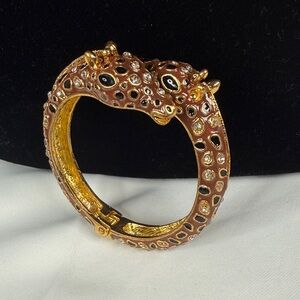 Sassy Jones Gold-Tone Giraffe Bangle Bracelet w/ Brown and Crystal Accent.